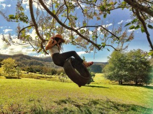 swinging in trees